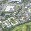 Oblique aerial view of the Royal Commonwealth Pool and Pollock Halls of Residence, looking WNW.