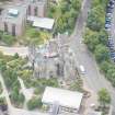 Oblique aerial view of St Leonard's Hall, looking SE.