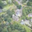 Oblique aerial view of Duddingston Parish Church, Churchyard and Watch Tower, looking WNW.
