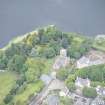 Oblique aerial view of Duddingston Parish Church, Churchyard and Watch Tower, looking SW.