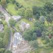 Oblique aerial view of Duddingston Parish Church, Churchyard and Watch Tower, looking ESE.