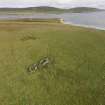 Oblique aerial view of Eynhallow farmsteads, looking north east.