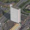 Oblique aerial view of Anniesland Court, looking NNW.