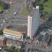 Oblique aerial view of Anniesland Court, looking W.