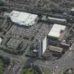 Oblique aerial view of Anniesland Court and shopping centre, looking ESE.