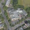 Oblique aerial view of Kelvinside Academy and gateway, looking NNW.