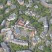 Oblique aerial view of Notre Dame School, looking NW.