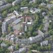 Oblique aerial view of Notre Dame School, looking WSW.