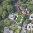 Oblique aerial view of Woodbank Carriage House, looking WNW.