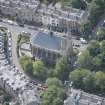 Oblique aerial view of Kelvinside Hillhead Parish Church, looking S.
