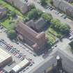 Oblique aerial view of the St Columba's Roman Catholic Church, looking S.