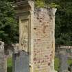 Terracotta monument to James to Reid and his wife Marie Claudine Nardin. Exposed brickwork on back of monument.