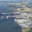 Oblique aerial view of Rosyth HM Dockyard, looking WNW.