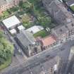 Oblique aerial view of St Andrew's East Church and Church Hall, looking NE.