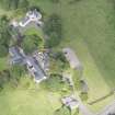Oblique aerial view of Peel Lodge, Tower House and Stables, looking NW.