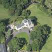 Oblique aerial view of Peel Tower House, looking NW.