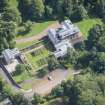 Oblique aerial view of Holmwood House, looking E.
