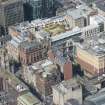 Oblique aerial view of the Britannia Building, St George's Tron Parish Church and Nelson Mandela Place, looking WNW.