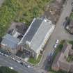 Oblique aerial view of St Mary's Roman Catholic Church, looking E.