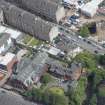 Oblique aerial view of St Anne's Roman Catholic Church and Presbytery, looking ENE.