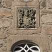 Detail of coat of arms above main entrance.