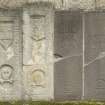 View of grave slabs against south wall of church.