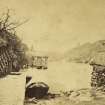 View of Loch Katrine showing pier and thatched cottage