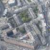Oblique aerial view of Rutland Square, Rutland Street and Caledonian Hotel, looking SSW.