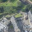 Oblique aerial view of Edinburgh Castle centred on the Butts Battery, looking W.