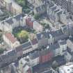 Oblique aerial view of Chessel's Court and Canongate, looking S.