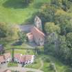 Oblique aerial view of Glencorse Parish Church, looking E.