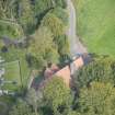 Oblique aerial view of Glencorse Parish Church, looking NE.