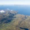 General oblique aerial view of Eigg, Rum and Canna with Gleann Meadhonach, Sleat, in the foreground, looking WSW.