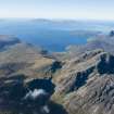 General oblique aerial view of Blabheinn with the Cullin Hills, Loch Scavaig, Soay, Eigg, Rum and Canna beyond, looking SSW.