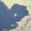 Oblique aerial view of Dun Mhic Leoid, looking NE.