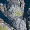 Oblique aerial view of Dunan Ruadh, looking E.