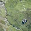 Oblique aerial view of Mingulay Chapel, looking SW.