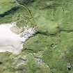 Oblique aerial view of Mingulay Chapel, Township and St Columba's Chapel, looking SW.