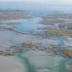 Oblique aerial view of the Uist Causeways, looking SE.