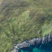 Oblique aerial view of Berneray Quay and The Aird, looking SW.