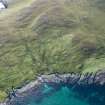 Oblique aerial view of Berneray Quay and The Aird, looking SW.