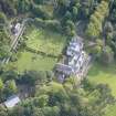 Oblique aerial view of Raasay House and walled garden, looking E.