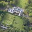 Oblique aerial view of Raasay House and walled garden, looking S.