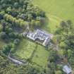 Oblique aerial view of Raasay House and walled garden, looking SSE.