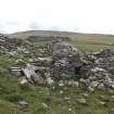 View of the main range showing the byre drain, looking SE.