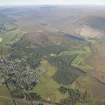 Oblique aerial view of Kingussie and Golf Course, looking W.