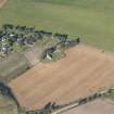 Oblique aerial view of Birnie Parish Church, looking NW.