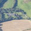 Oblique aerial view of Pluscarden Abbey, looking SW.