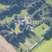 Oblique aerial view of Pluscarden Abbey, looking S.