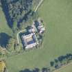 Oblique aerial view of Altyre House Stables, looking NE.